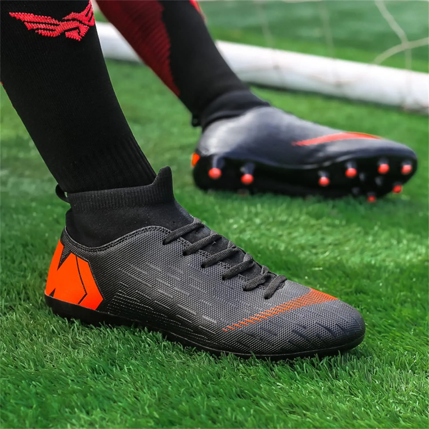 Unisex soccer sneakers are light, breathable, non-slip and shock-absorbing, and The youth high-top indoor lawn training hard bottom TF/AG.