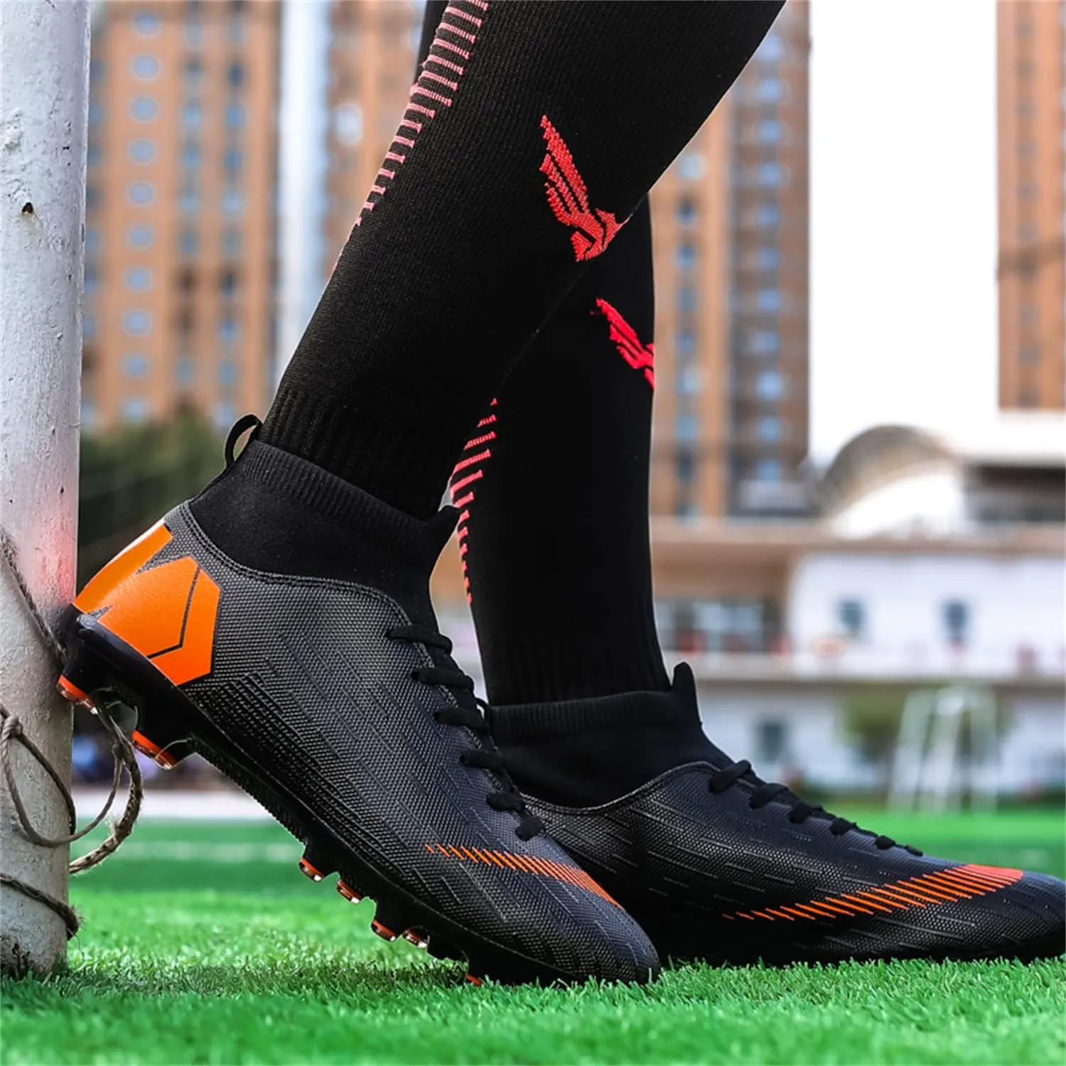 Unisex soccer sneakers are light, breathable, non-slip and shock-absorbing, and The youth high-top indoor lawn training hard bottom TF/AG.
